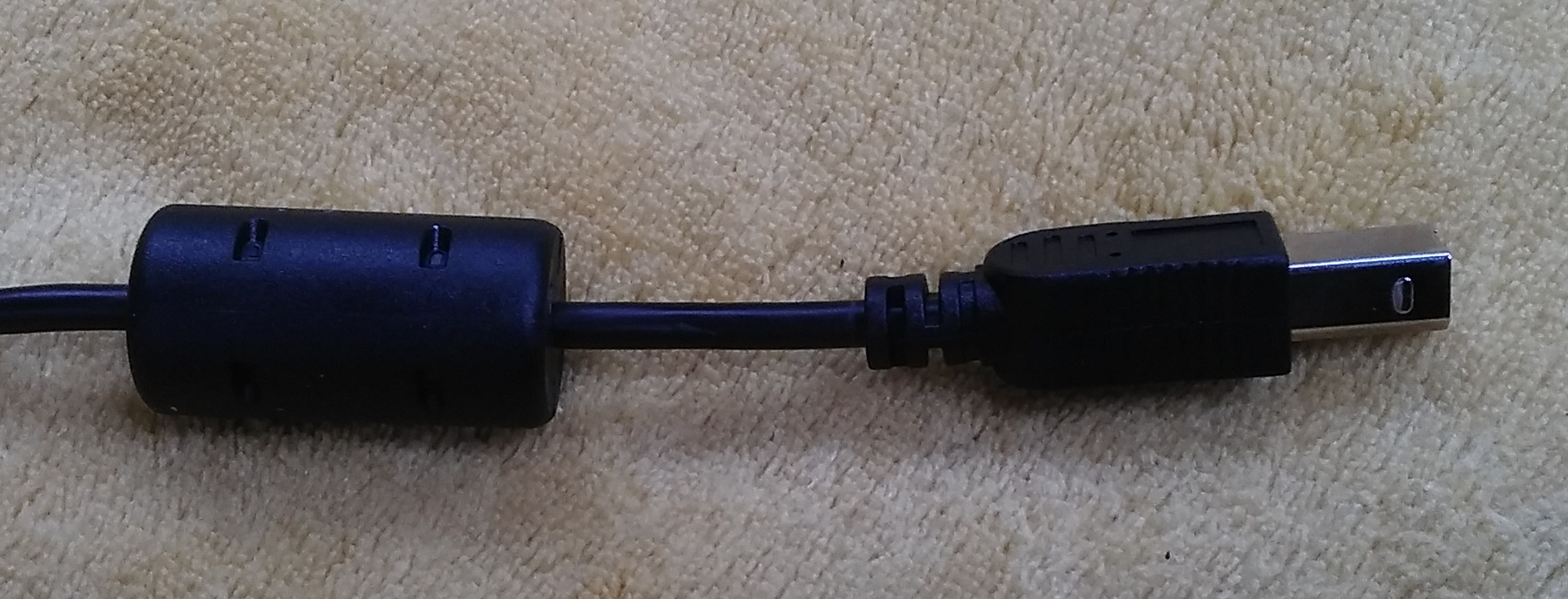 Ferrite common-mode choke ring.